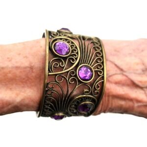 Vintage Cookie Lee Bronze Tone Filigree Cuff Purple Rhinestones Bracelet